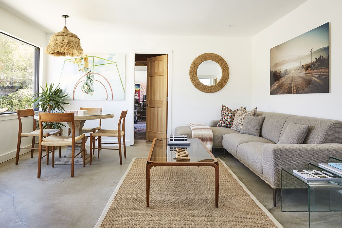 Lodge living and dining area with sectional sofa and round table