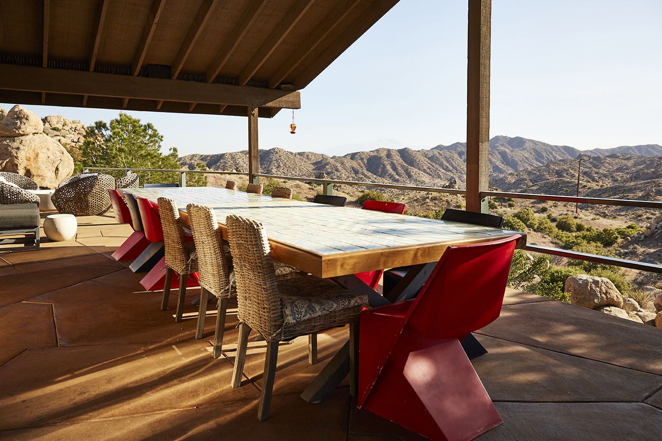 Dining table set in the Main House at sunset