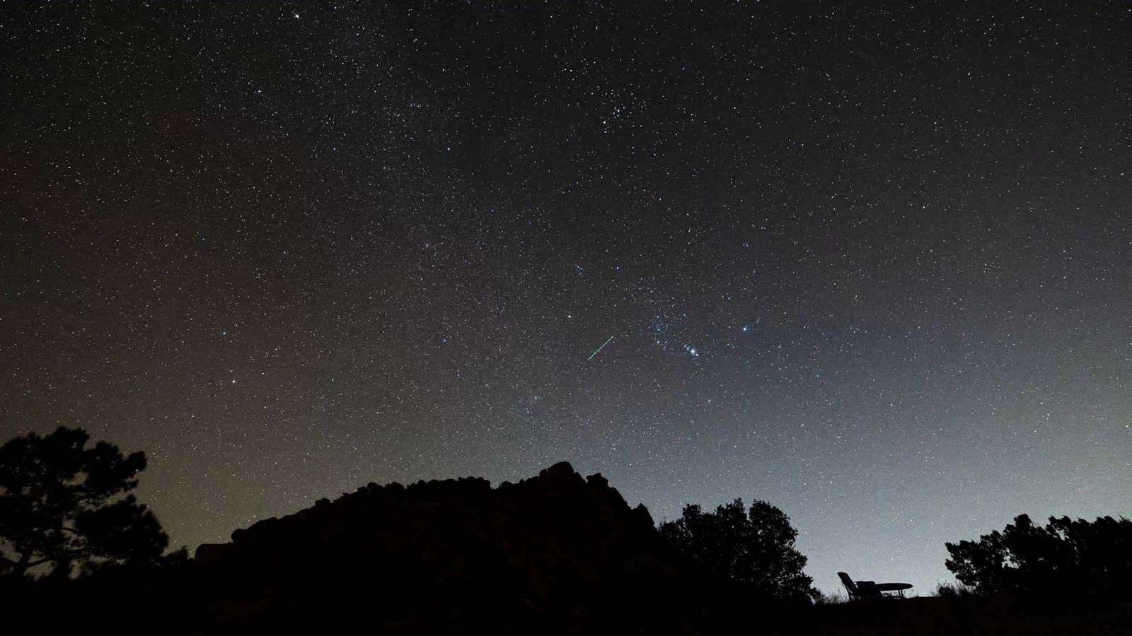The night sky over ESCAPE — stars and the Milky Way above 140 acres of high desert in Pioneertown, California