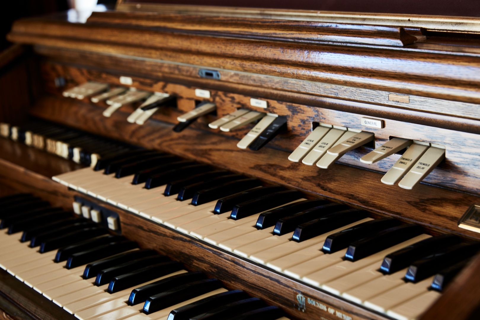Studio One at ESCAPE — vintage pump organ keys close-up