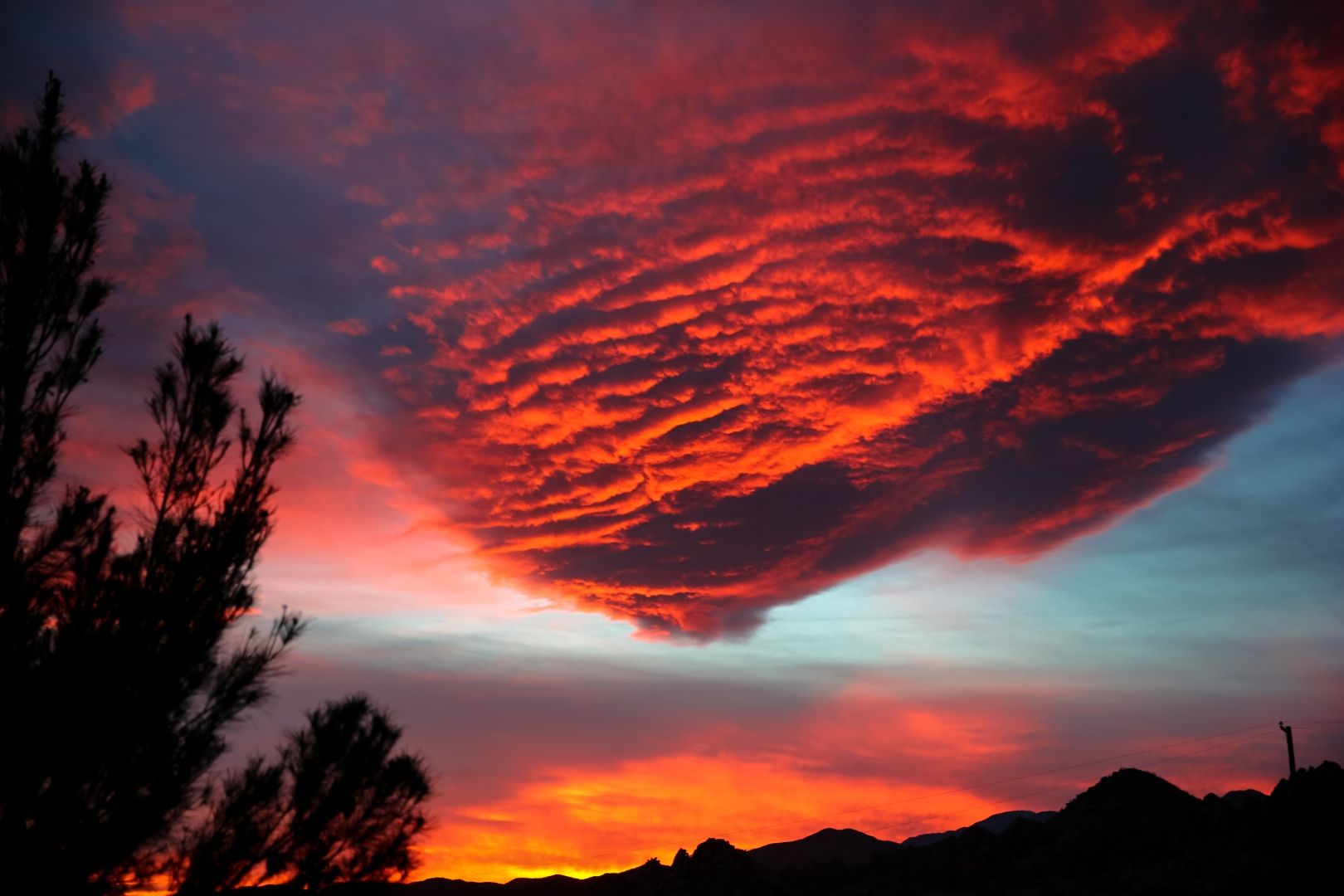 High desert sunset clouds — photography for The Signature drop is coming soon